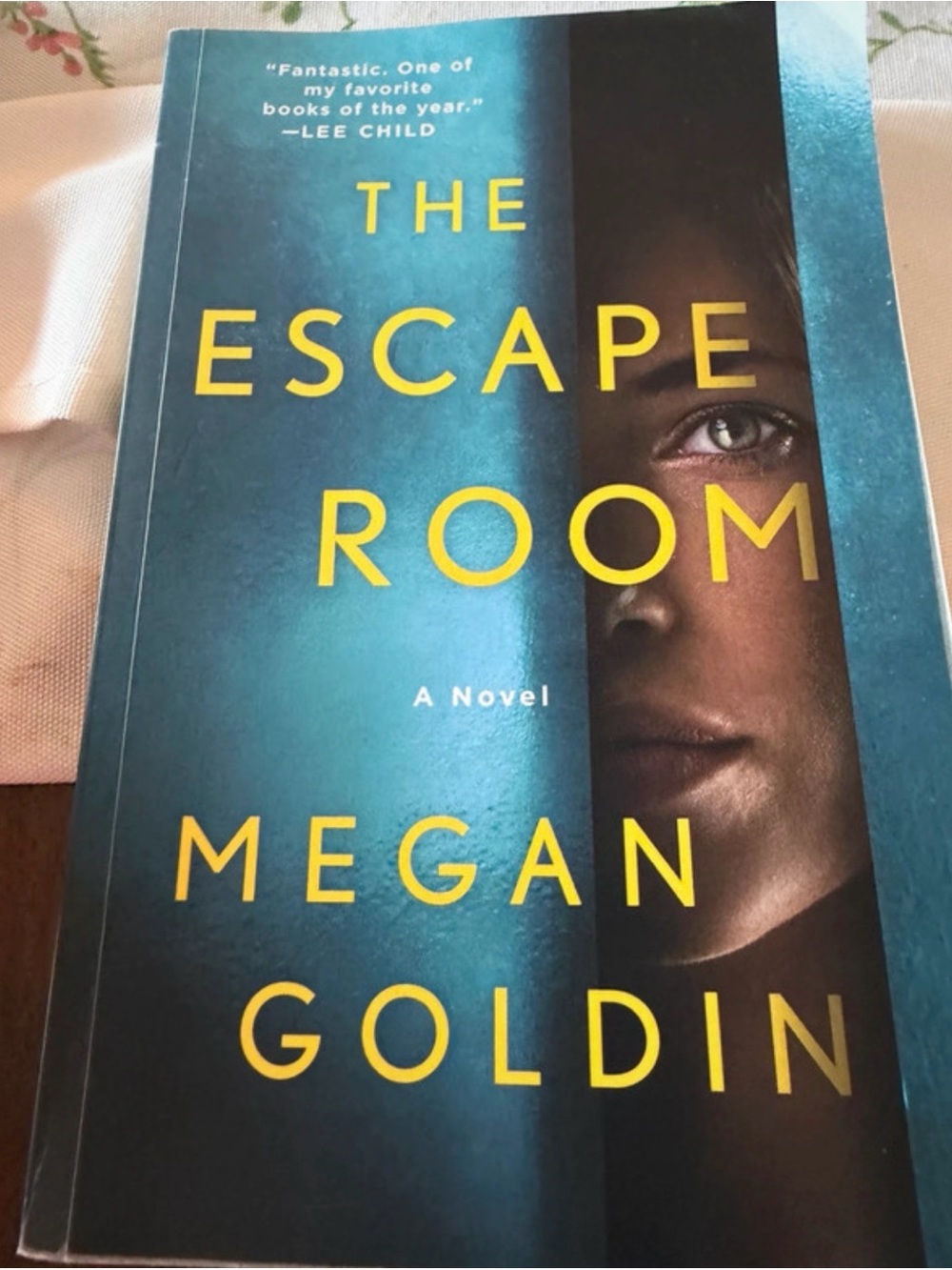 The Escape Room by Megan Goldin - Teal & Black Paperback- Thriller